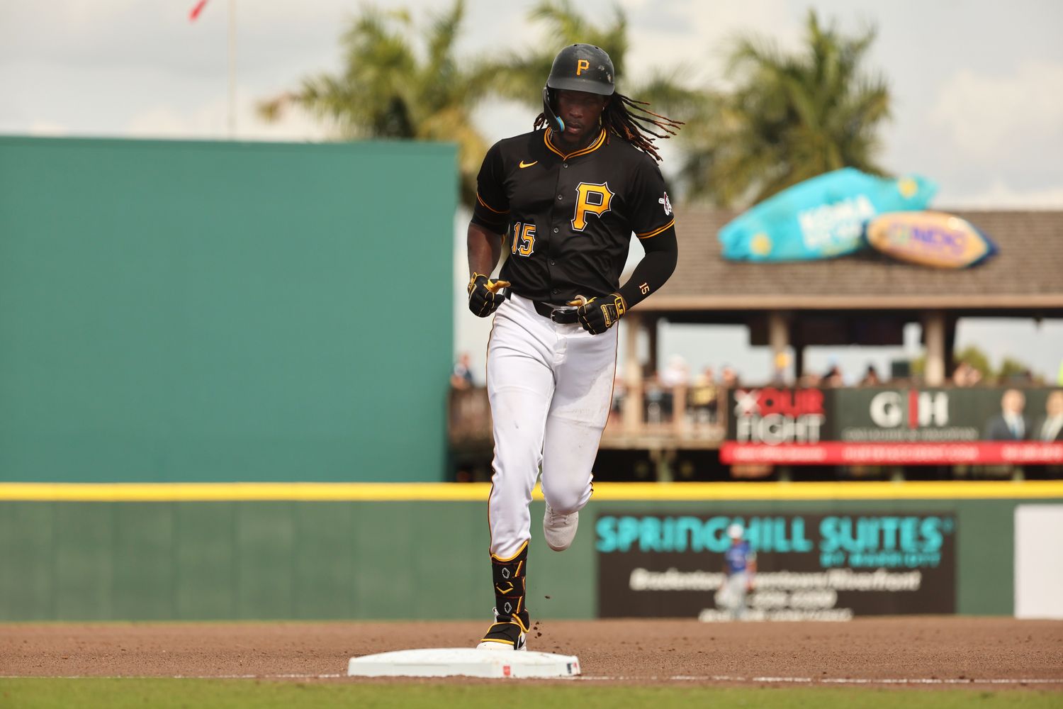 Mar 5, 2024; Bradenton, Florida, USA; Pittsburgh Pirates shortstop Oneil Cruz (15) runs around the bases after he hit a home run during the fifth inning against the Toronto Blue Jays at LECOM Park.